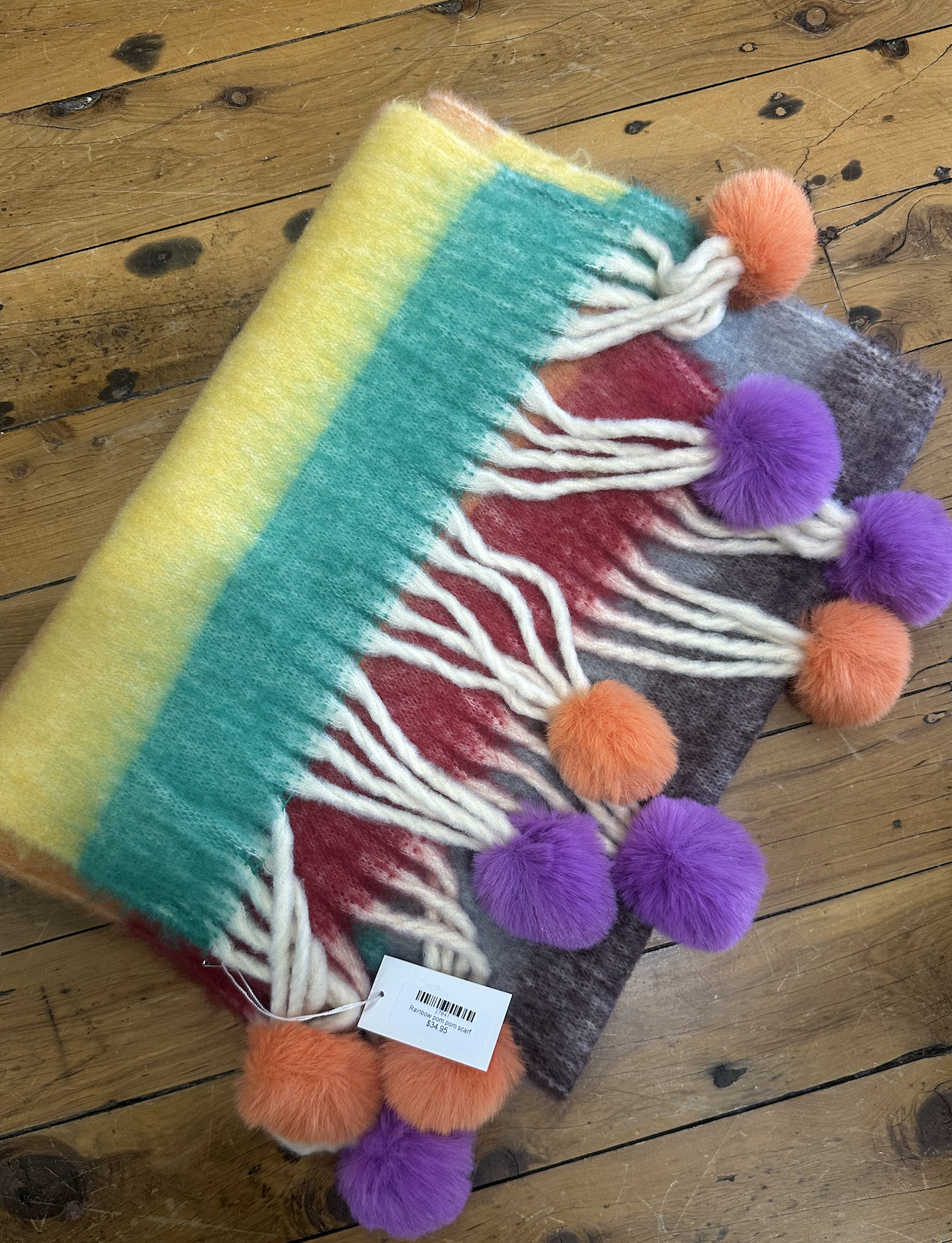Rainbow pom pom scarf