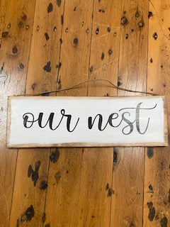Our nest - sign